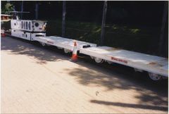 Narrow gauge trucks to transport lining segments to TBM.